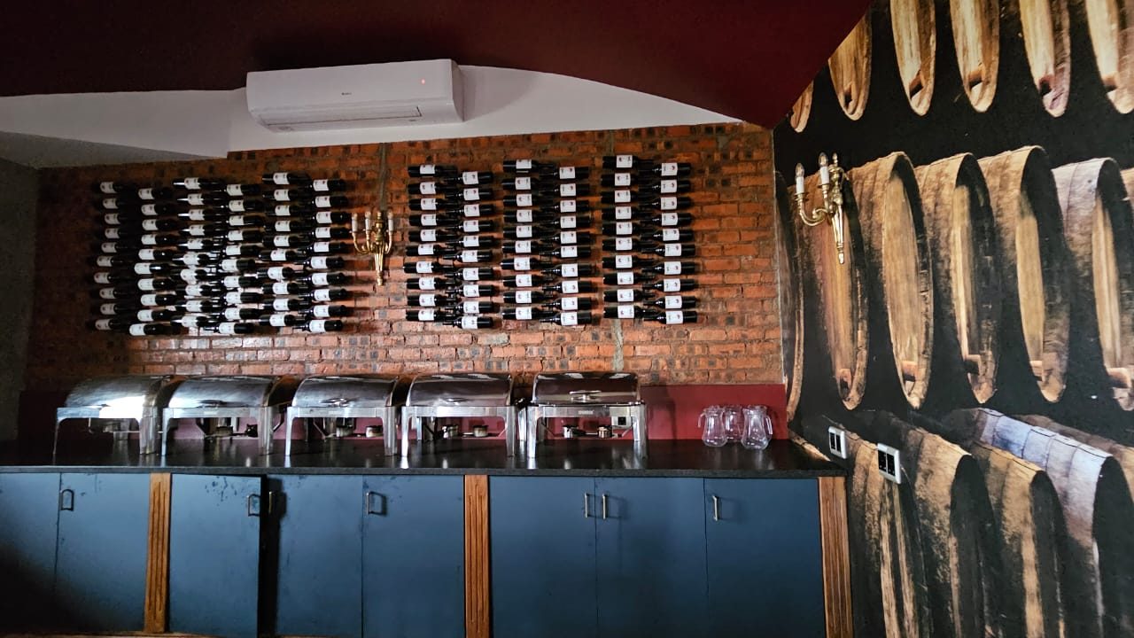 Wine cellar with breakfast buffet chafing dishes